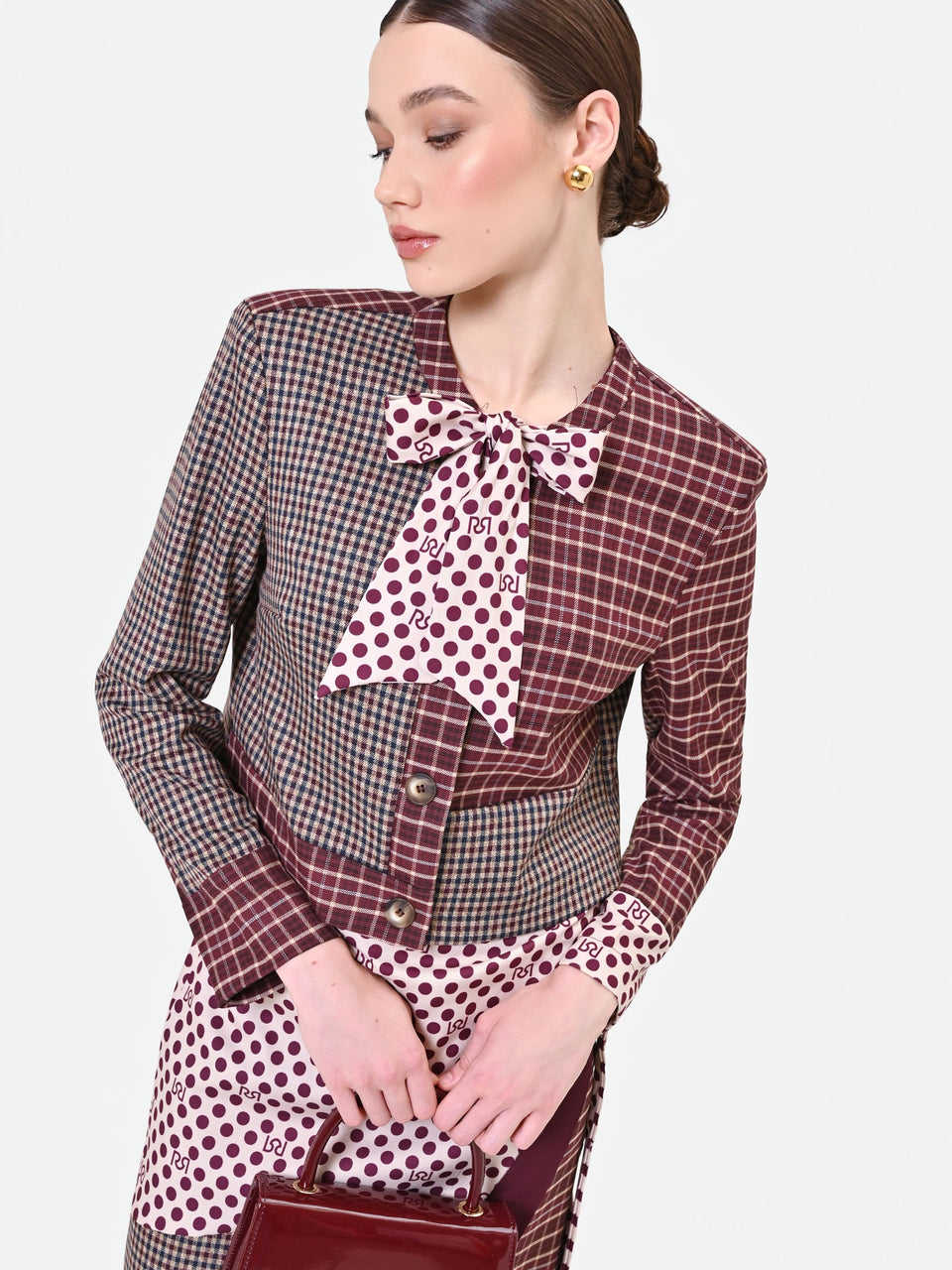 Rinascimento giacca bordeax con design patchwork e fiocco