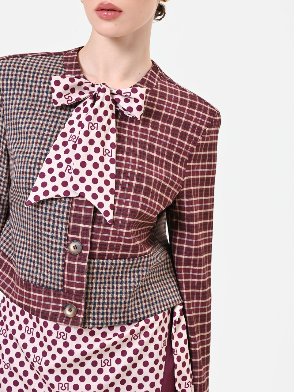Rinascimento giacca bordeax con design patchwork e fiocco